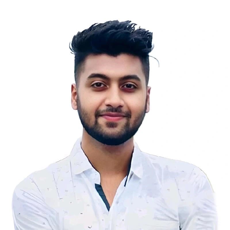 A man in a blue shirt stands with arms crossed, representing Mir Ahadul Islam, Business Development Executive at Rankupper.